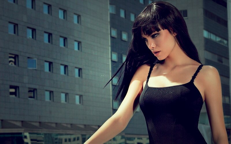 woman in black top on rooftop