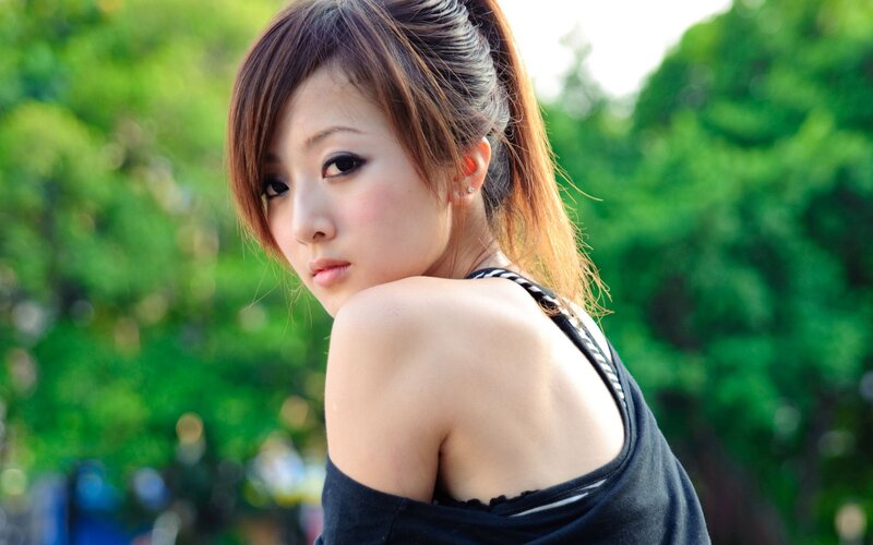 woman in black top outdoors