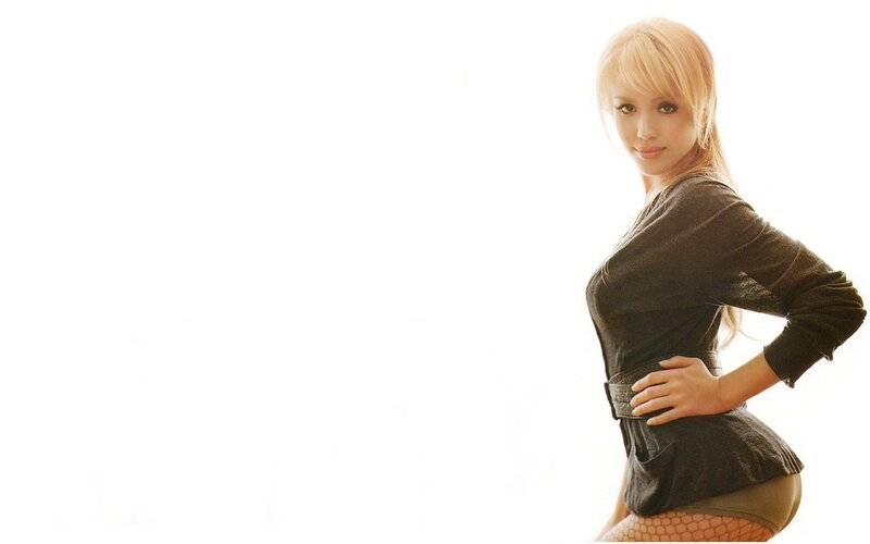 woman in black top posing