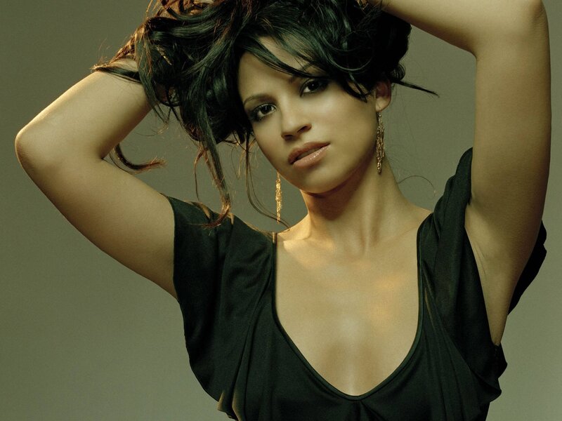 woman in black top posing