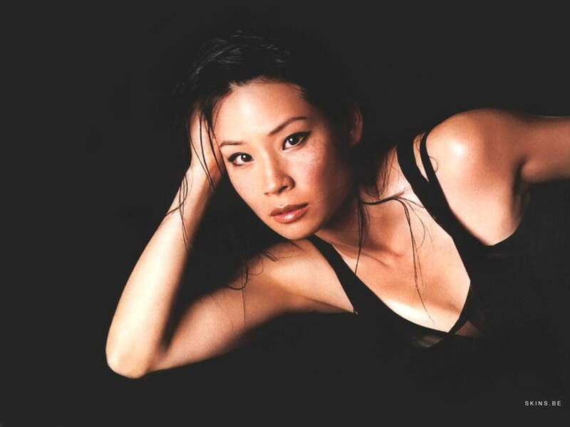 woman in black top posing