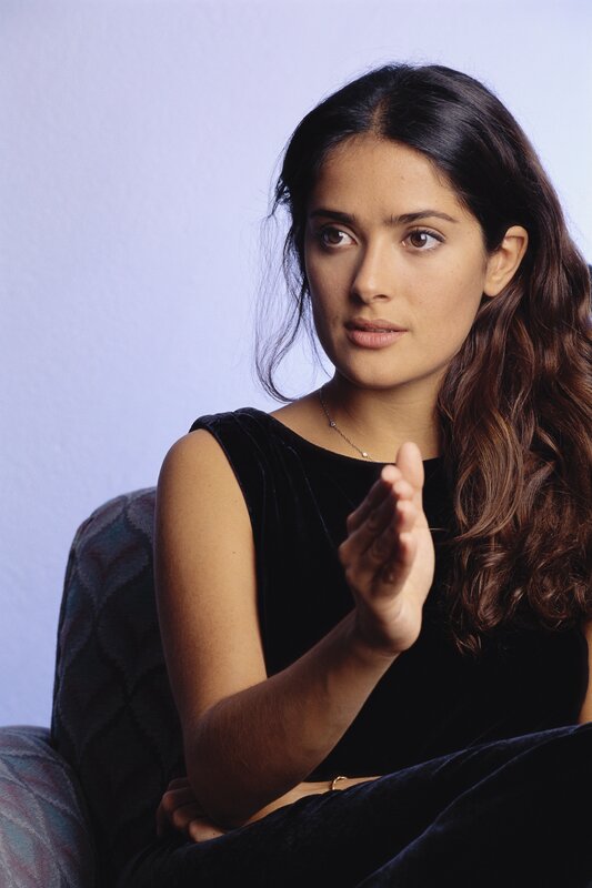 woman in black top sitting