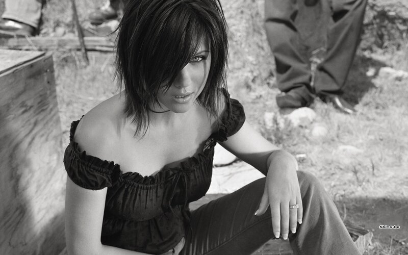 woman in black top sitting