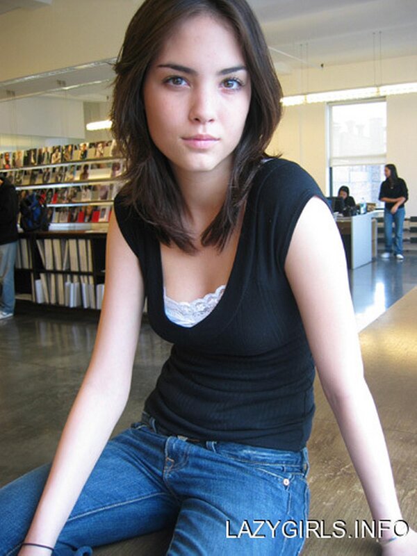 woman in black top sitting