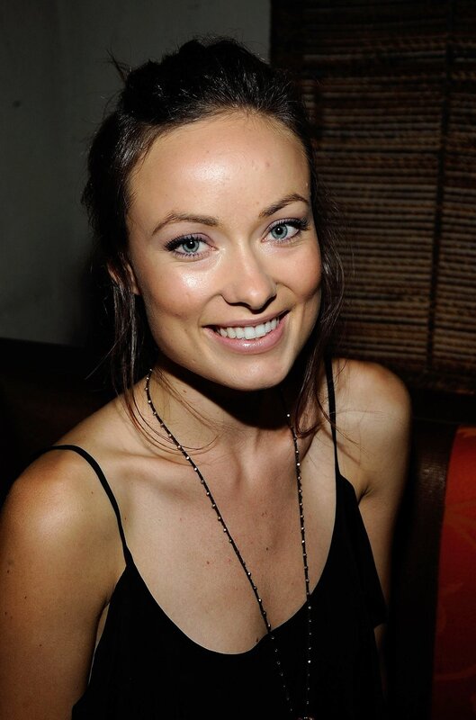 woman in black top smiling