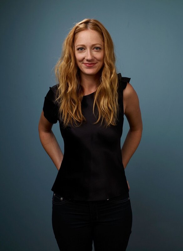 woman in black top smiling