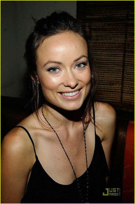 woman in black top smiling
