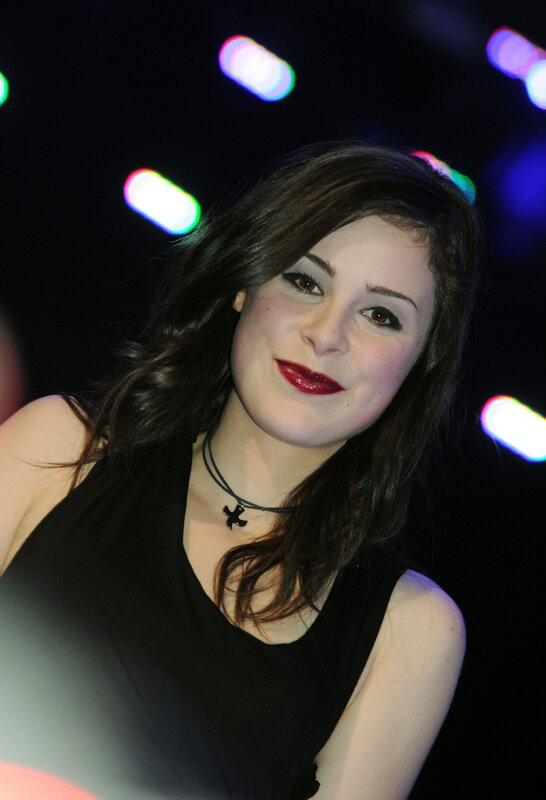 woman in black top smiling