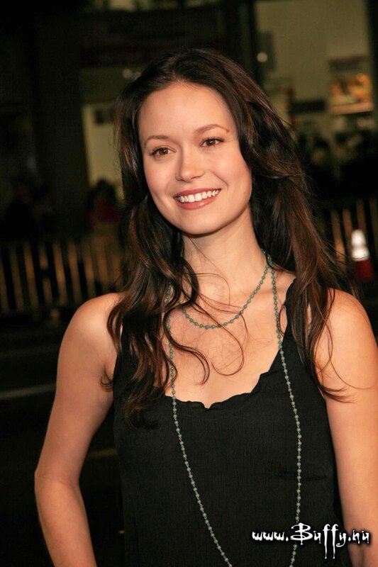 woman in black top smiling