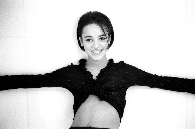 woman in black top smiling