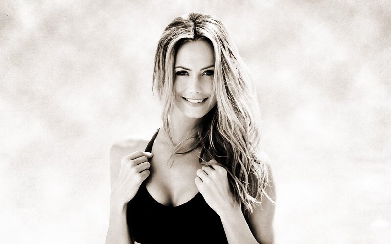 woman in black top smiling