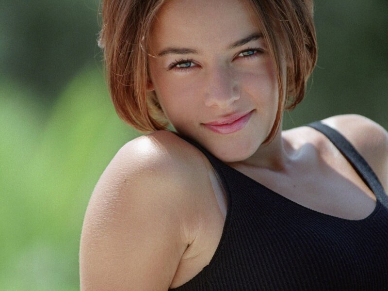 woman in black top smiling