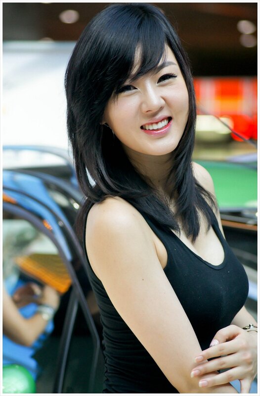 woman in black top smiling