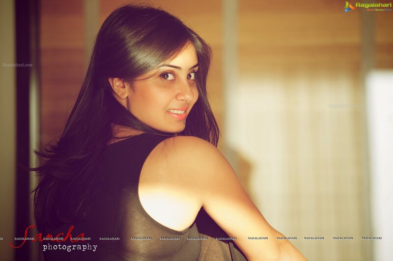 woman in black top smiling