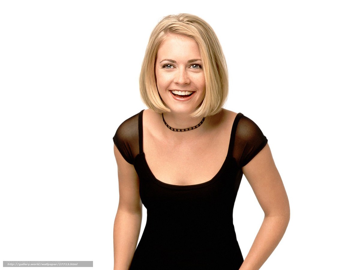 woman in black top smiling