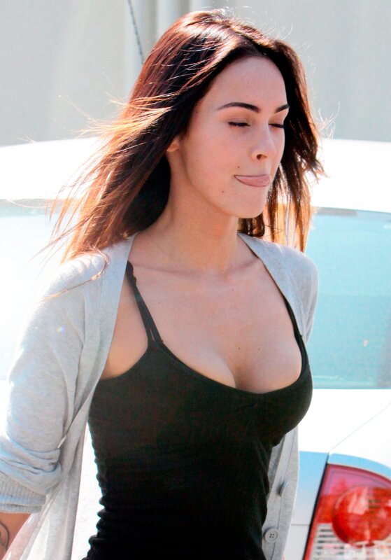 woman in black top walking