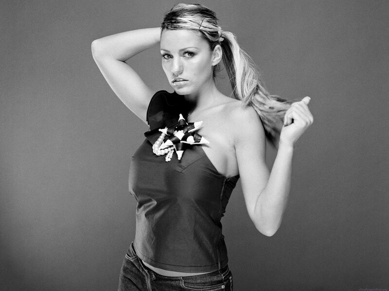 woman in black top with bow