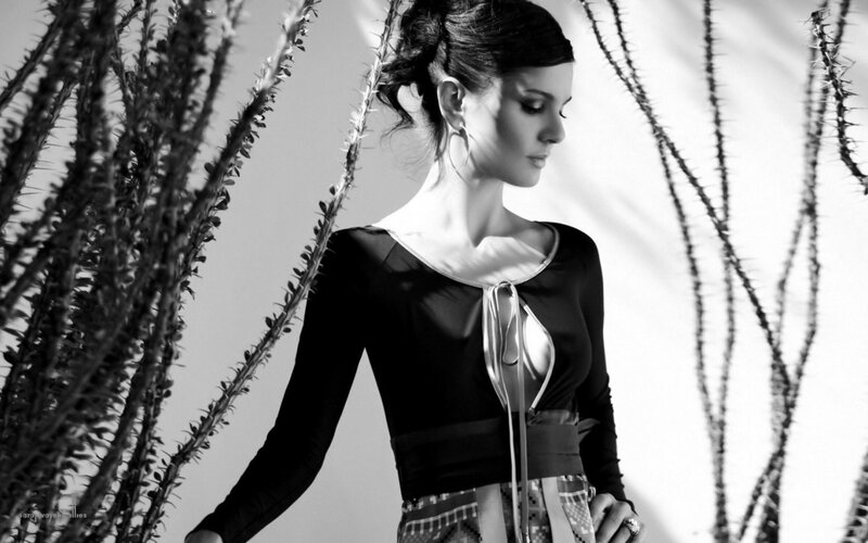woman in black top with cactus
