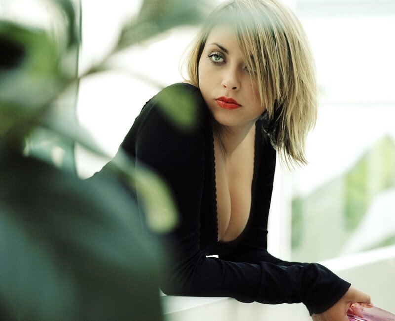 woman in black top with red lipstick