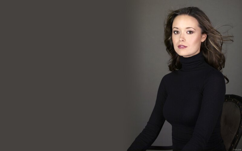 woman in black turtleneck