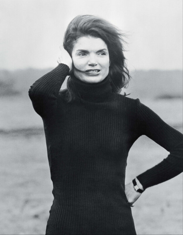 woman in black turtleneck