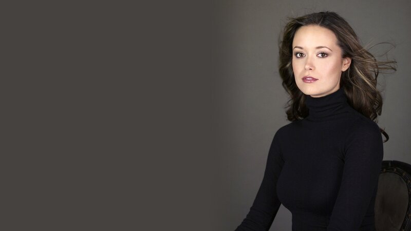 woman in black turtleneck