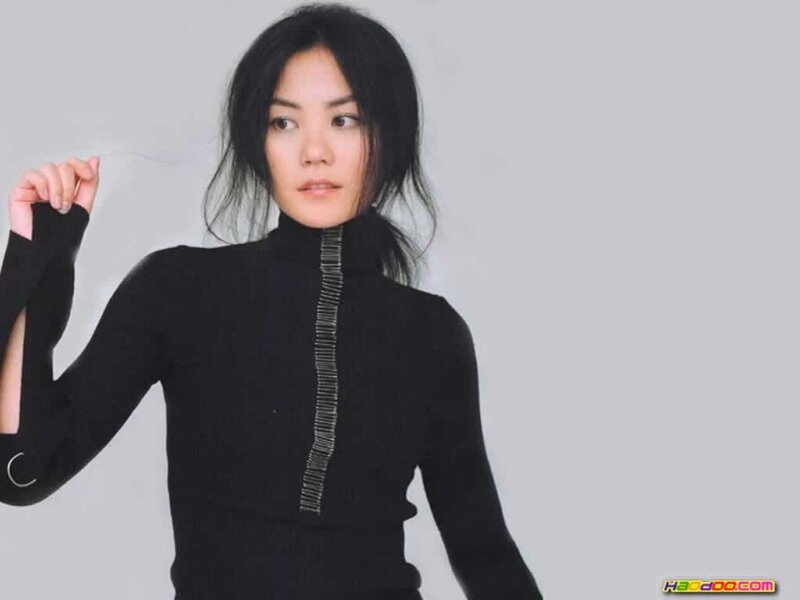 woman in black turtleneck