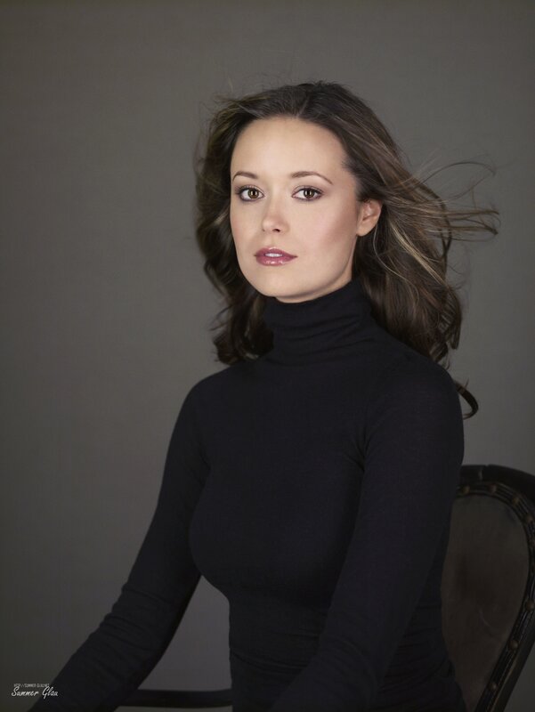 woman in black turtleneck