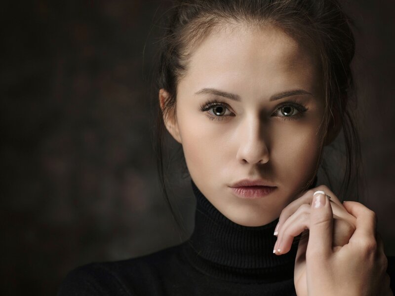 Woman in Black Turtleneck — Serious, Photograph, Hand