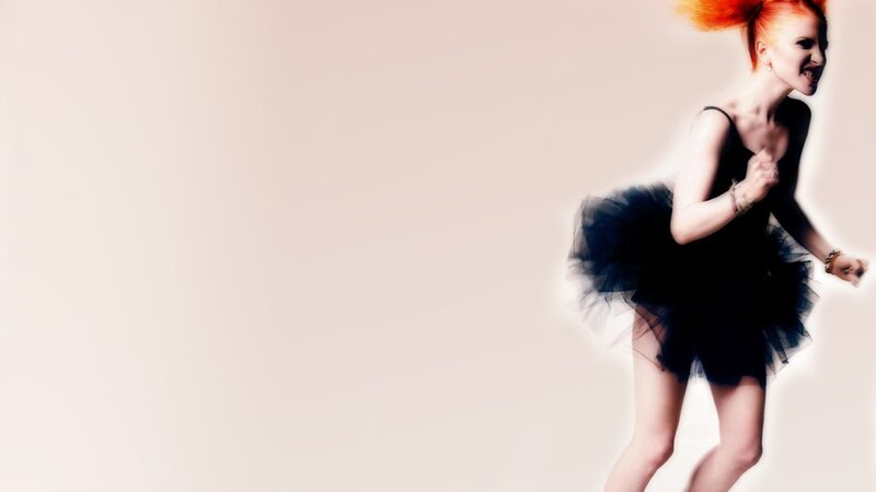 woman in black tutu running