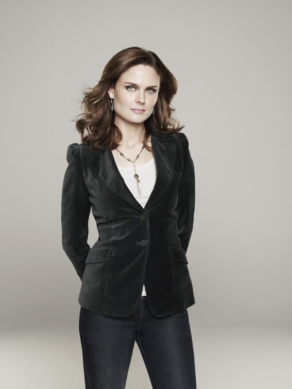 woman in black velvet blazer
