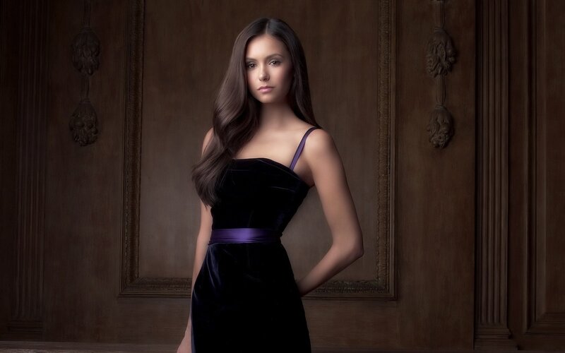 woman in black velvet dress