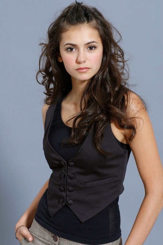 woman in black vest