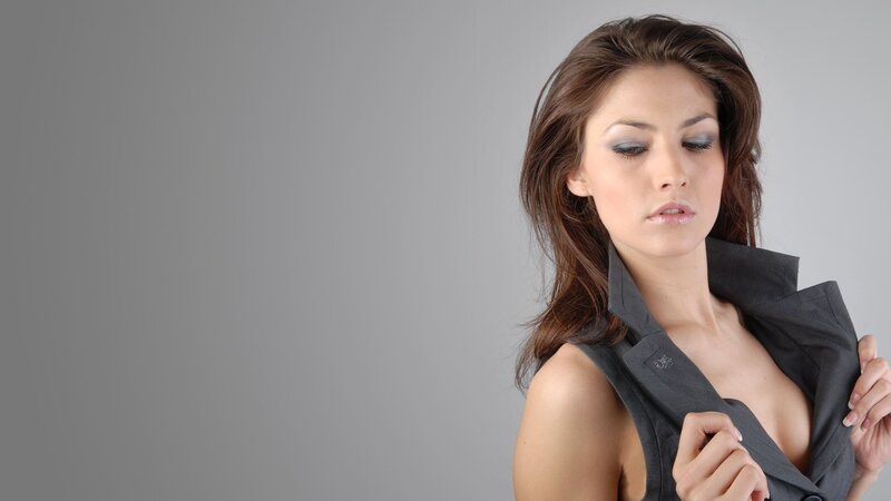 woman in black vest