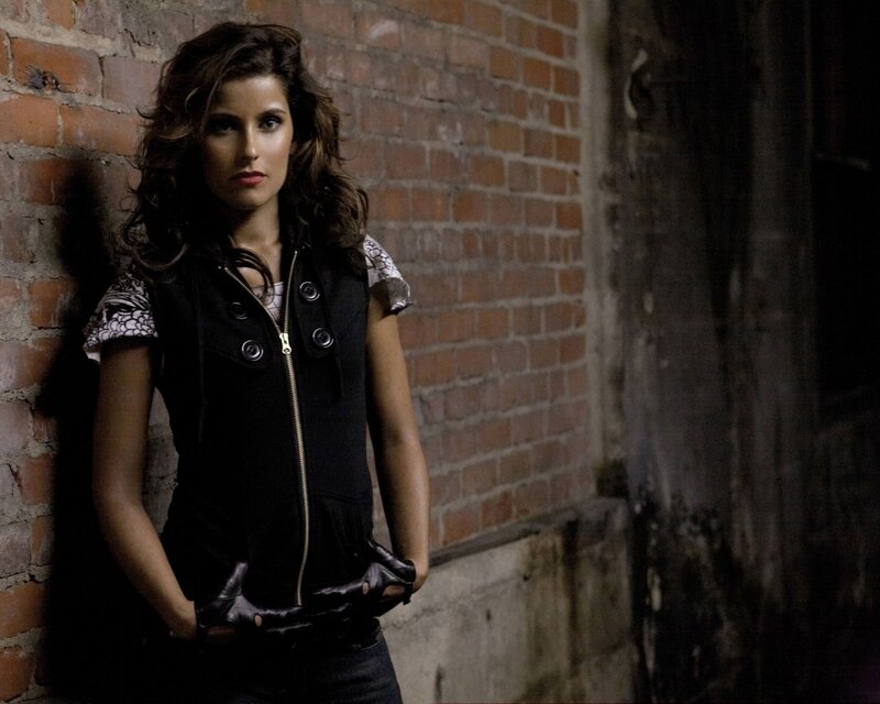 Woman in Black Vest — Serious