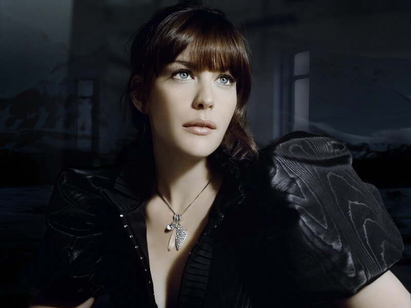 woman in black with blue eyes