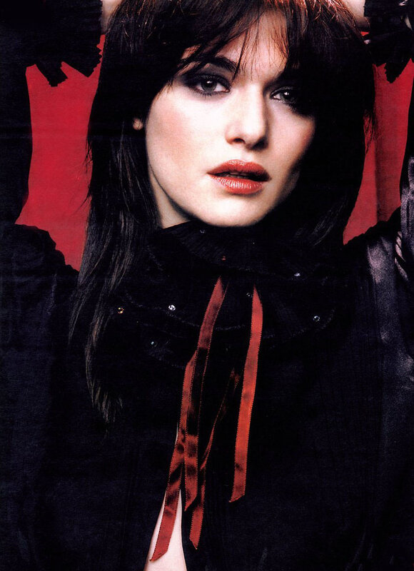 woman in black with red ribbons