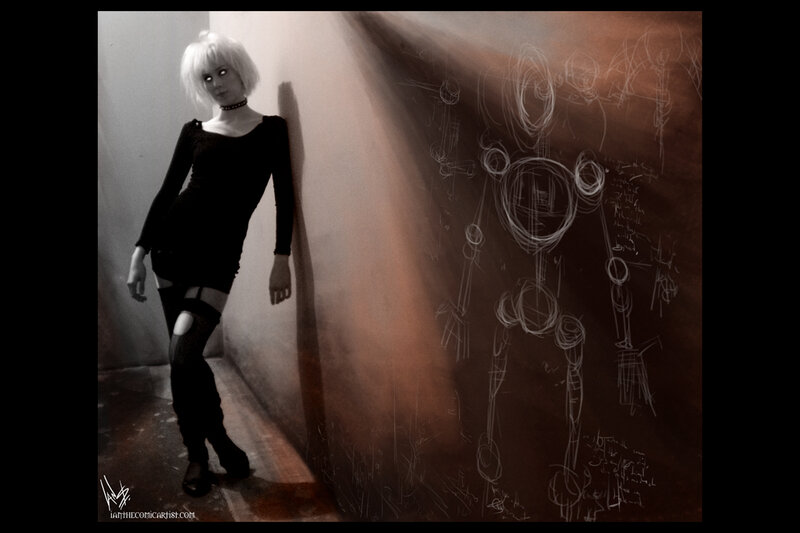 woman in black with sketch wall