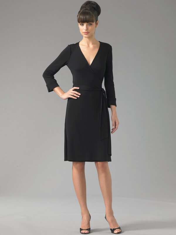 woman in black wrap dress