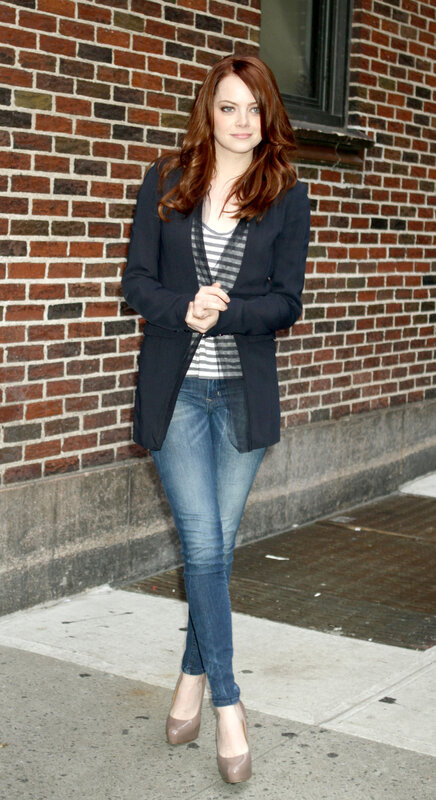 woman in blazer and jeans