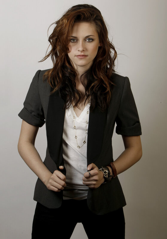 woman in blazer and white top