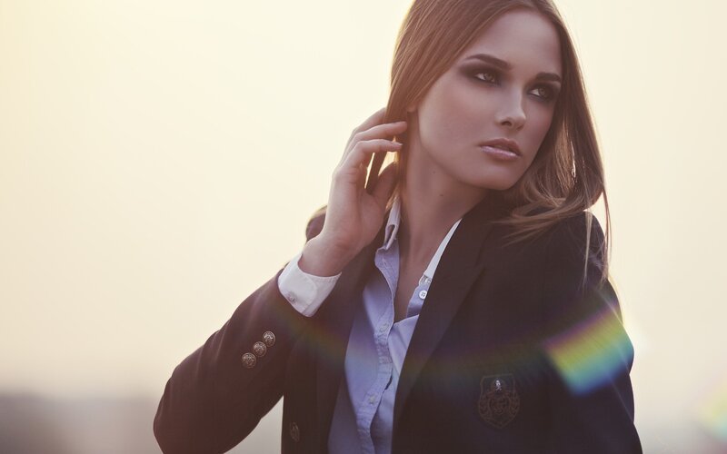 woman in blazer at sunset