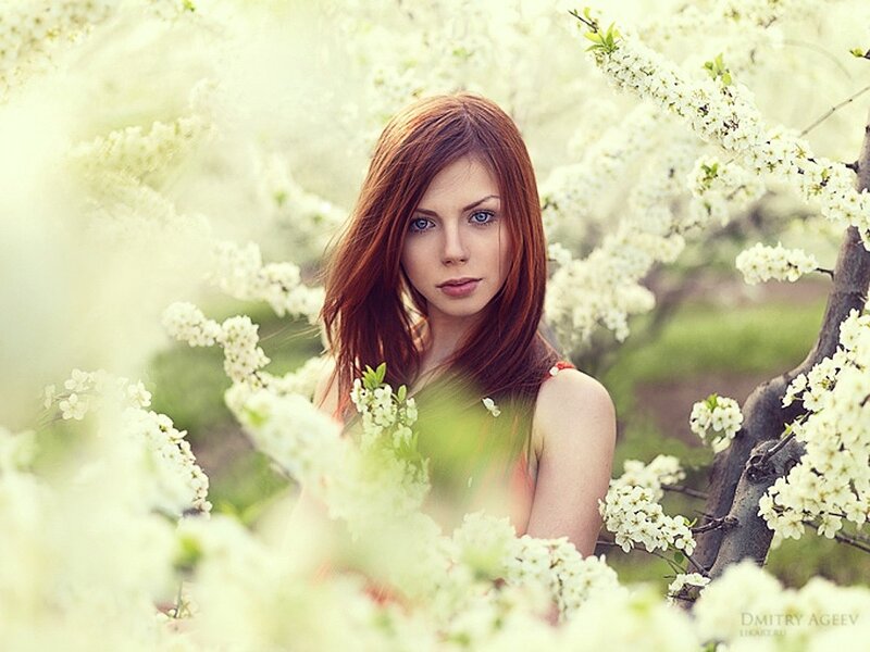 woman in blooming garden