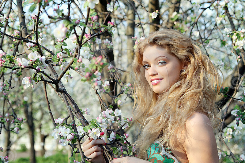 Woman in Blooming Orchard