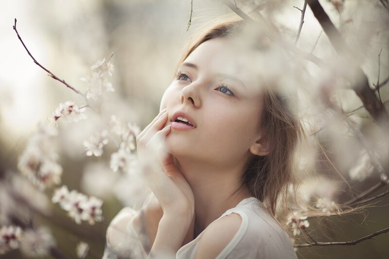 Woman in Blossoming Tree — White