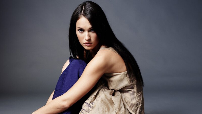 woman in blue and gold dress