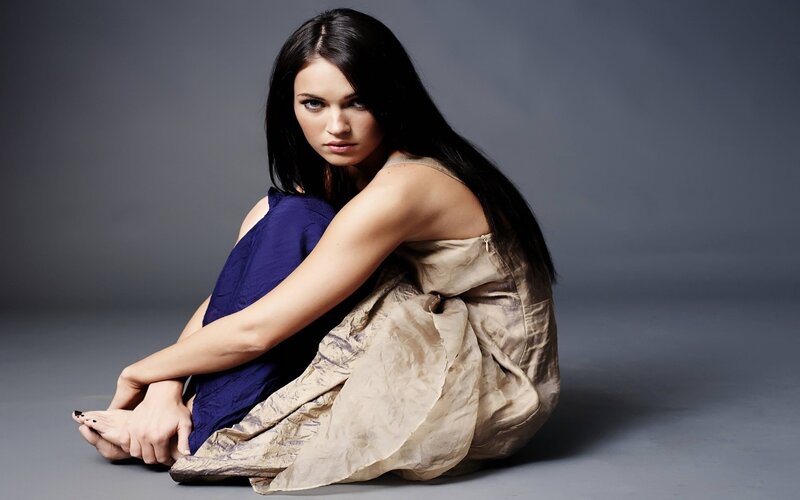 woman in blue and gold dress
