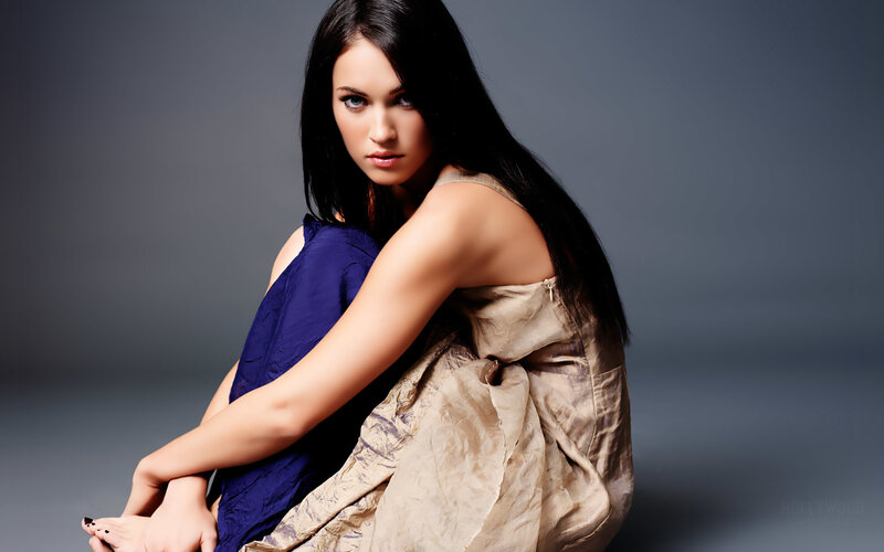 woman in blue and gold dress