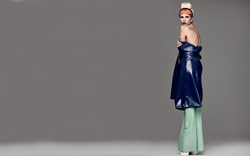Woman in Blue and Green Outfit — Dramatic