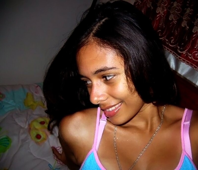 woman in blue and pink top